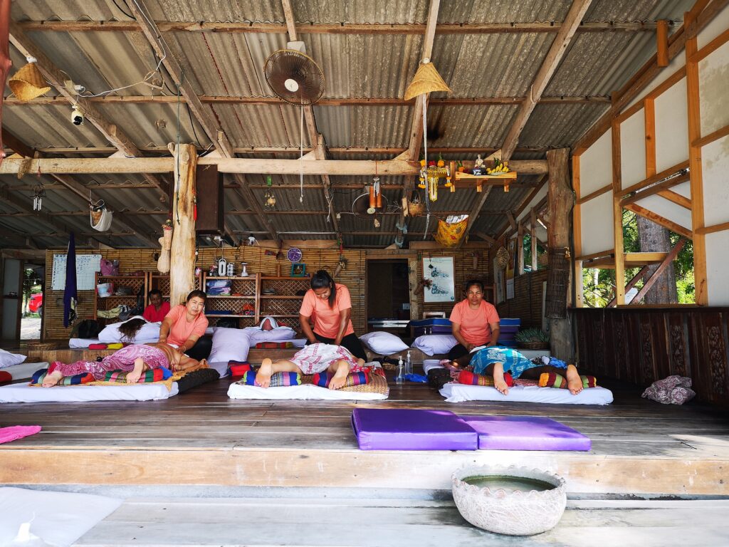 Traditional Thai massage practice in Thailand showing authentic Thai bodywork technique